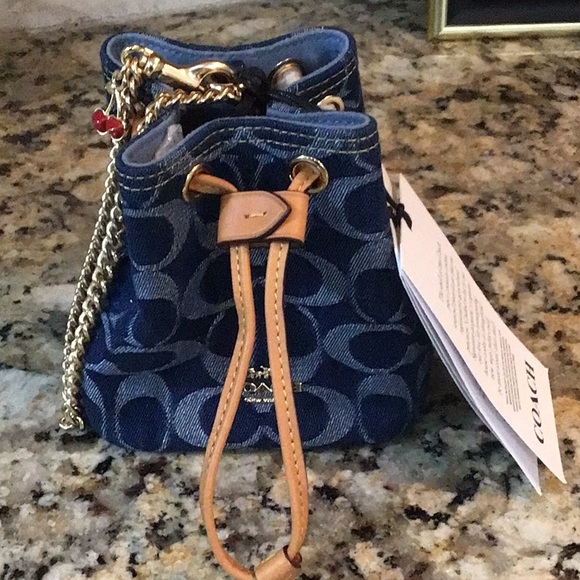 Coach Handbags - NWT Limited Edition Coach Blue Denim Cherry Mini Bucket Wristlet